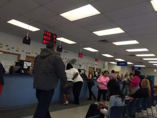 Inside the DMV-everyone looks so happy!