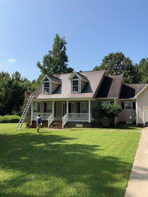 Soft wash roof cleaning