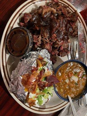 Chopped brisket, beans and baked potato.