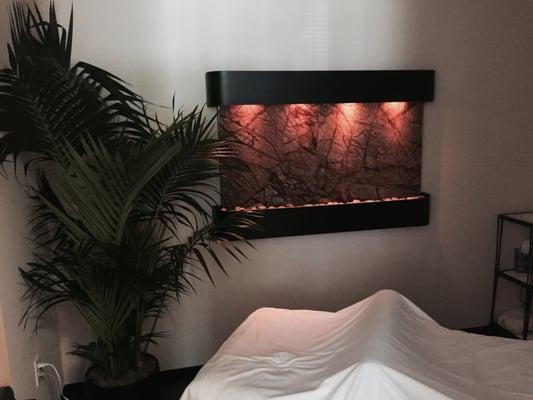 One of three massage rooms with relaxing wall water fountains.