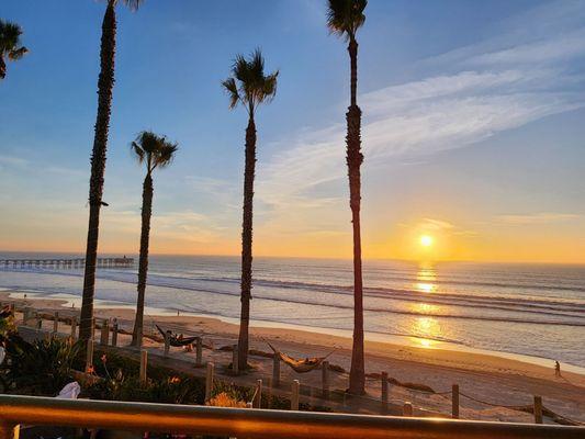 View from oceanfront room at sunset