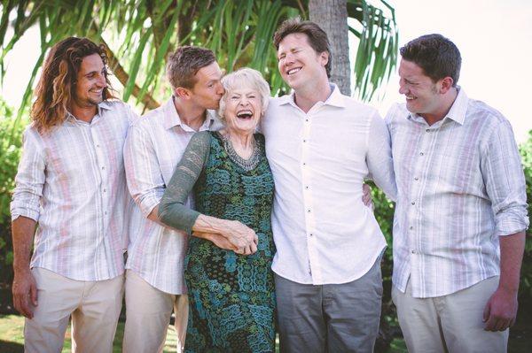 Grannie getting sweet lovin from the groom and his posse on wedding day