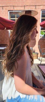 Beautiful,  natural highlights and gorgeous cut and style!