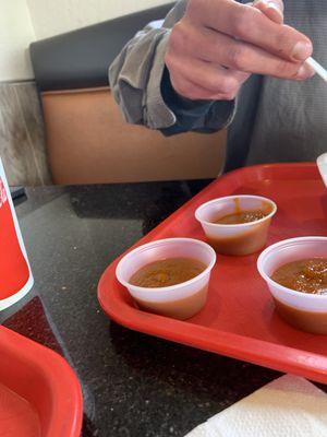 They charge for half a cup of hot sauce