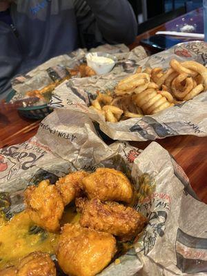 Mild boneless wings and curly fries