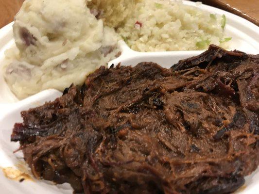 brisket plate with smashed potatoes and coleslaw