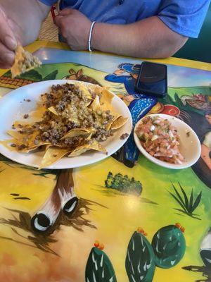 Nacho chips with beef and cheese....pico de gallo was ordered on side