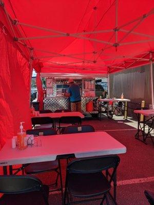 Plenty of outdoor seating under the Red tent.