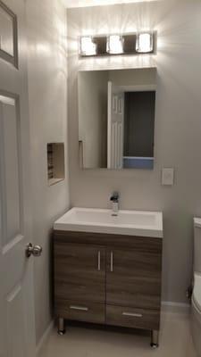 custom sink, niche, recess cabinet and led light