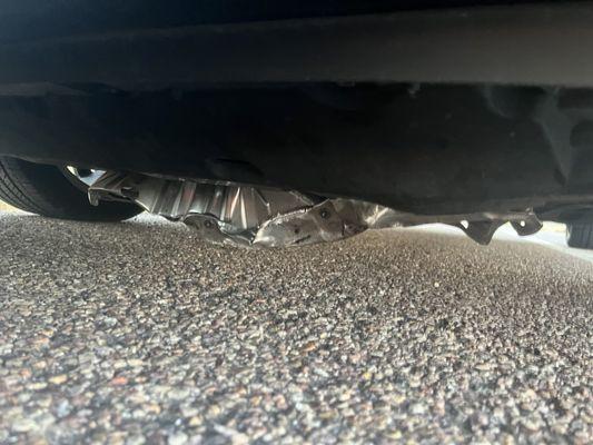 An unscrewed skid plate