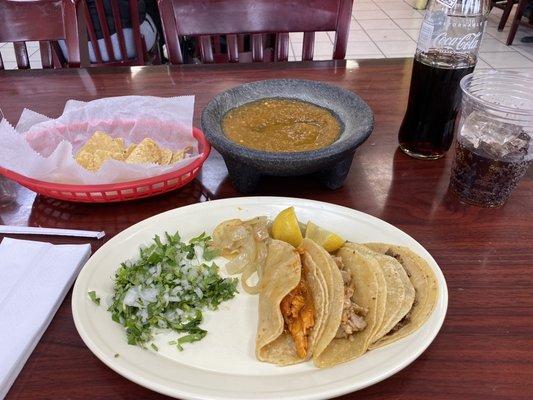 Less garnish, but enough really. Tacos are tasty. Salsa is spicy hot which I like. Chips are fresh