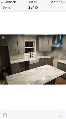 Light gray shaker cabinets, shadow storm countertop