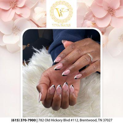 Make a statement with our timeless french nails featuring striking black and white designs, perfect for adding a touch of elegance to any en