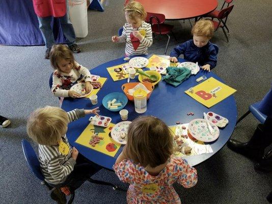 Communal Snack Time happens each class. Sharing and manners are encouraged.