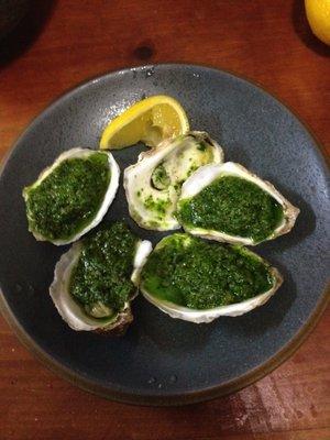 Historic Oysters Rockefeller. This is made with an herbed compound butter - no spinach. Oh and some Absinthe