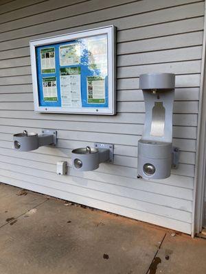 Water fountains including bottle refill station