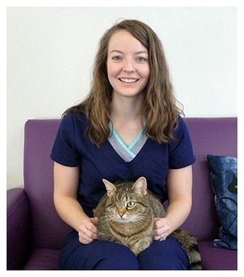 Dr. Hagley, veterinarian at Purrfect Care Feline Medical Center, with her one-eyed tabby cat Una.