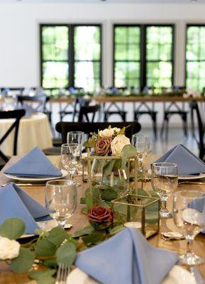 Table decor on the solid walnut tables at South Haven Creations.