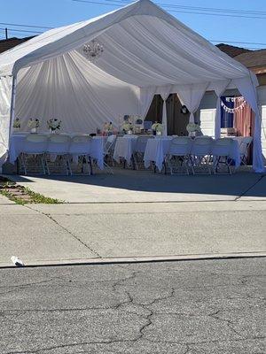 Tables, chairs, linens, draped tent with chandelier and port-o-potty!