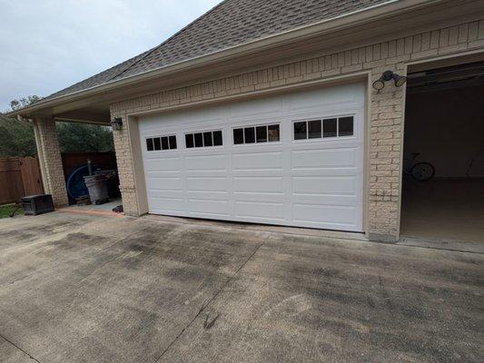 16x8 non insulated garage door with long panel windows