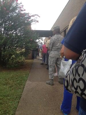 The line outside before they open at 8:00. There are about 15 more behind me. Hurry up and open the door!