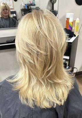 Layered haircut and blowout