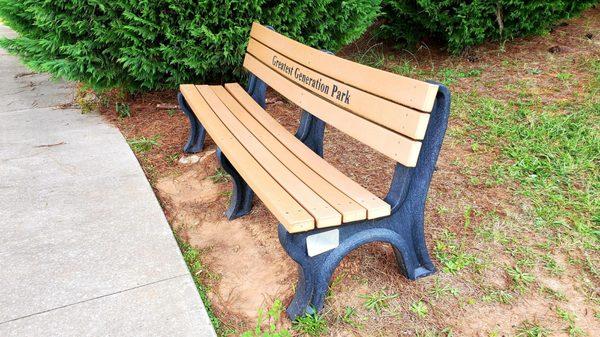 Park bench at GREATEST GENERATION MEMORIAL PARK in Thomaston, Georgia.