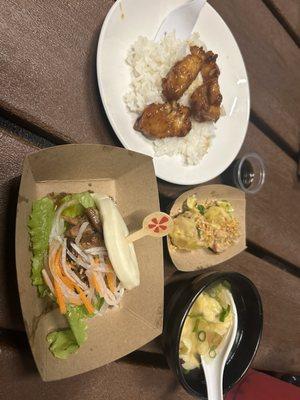 Orange chicken, wonton soup, braised pork belly bao, and pork shumai