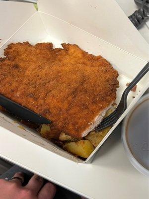 Hand for scale, this schnitzel was huge!