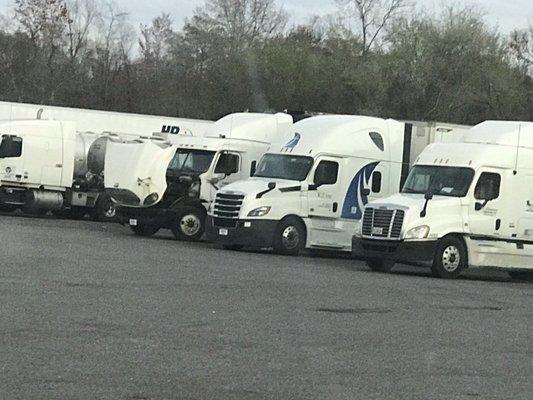 Numerous parking for 18 Wheeler Trucks. }:{