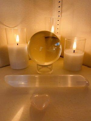 Glass flame less candles, spherical crystal, long shaped crystal and one heart shaped crystal.