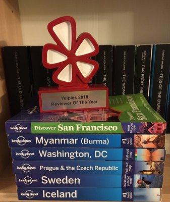 My collection of Lonely Planet books -- just a fraction of the places I've travelled to.