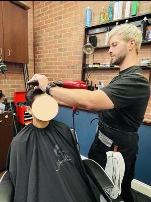 Alan taking his time to create a perfect cut!