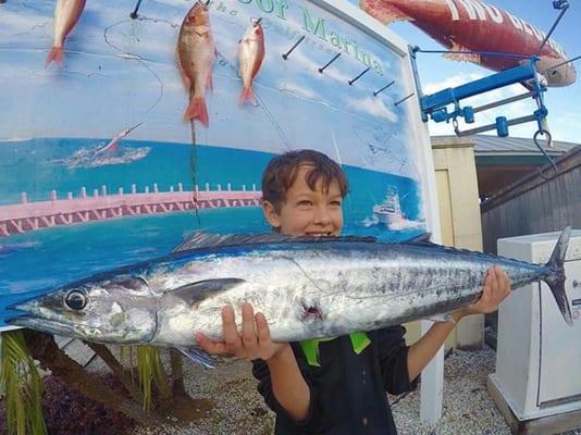 This little boy caught his first wahoo ever!