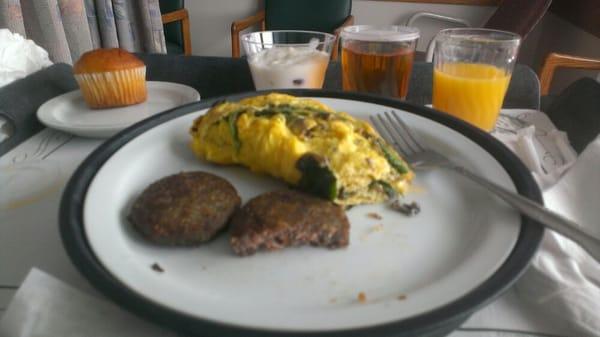 Swiss & mushroom & cheese omelet, sausage & juice for breakfast. This was very good and hit the spot.