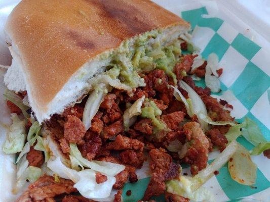 Adobada torta (marinated pork) (to-go packaging).