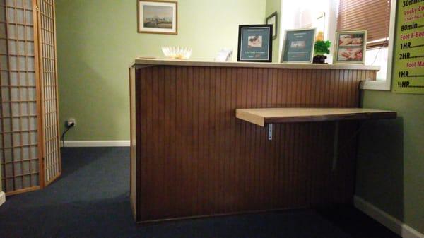 Receptionist desk. It's slightly dark in here but the ambience is still ok for a massage place