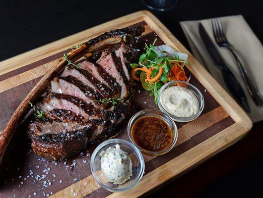 Prime Dry Aged Tomahawk Experience -  Long Bone Ribeye. Bearnaise, demi-glace, bone marrow butter