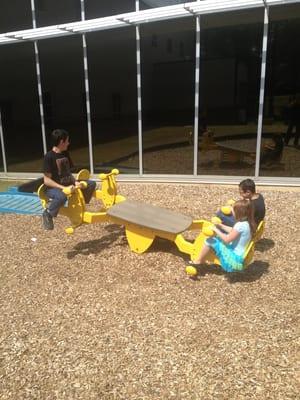 Sire, thane and some unknown girl on quad seesaw