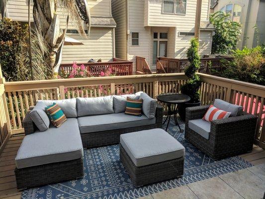 The Icon with granite cushions and Sunbrella Outdoor Pillows.