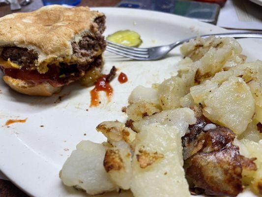 Cheese burger with American fried potatoes