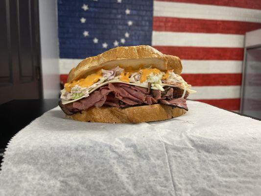 G Babe  hot Pastrami Swiss cheese                           Coleslaw               Russian dressing              on Italian or Rye