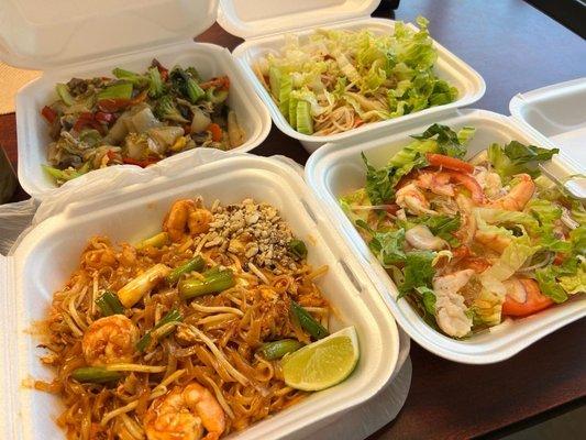 Shrimp pad Thai, pad woon sen, pad kee mao beef and Laos papaya salad