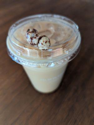 Coffee beans on top of drink at The Human Bean.