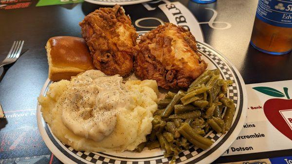 Two chicken breasts roll green beans, mashed potatoes, white gravy Sweet tea salad bar