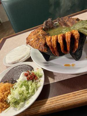 Molcajete comes with a side of rice and beans