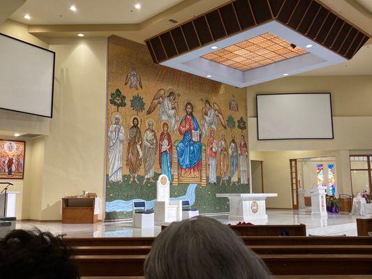 A complete photo of the new alter and mural at the front of the church