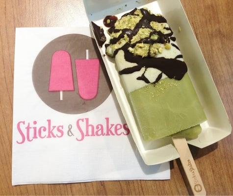 Green Tea Stick, Half-dipped in White Chocolate, Sprinkled with Pistachios and Milk Chocolate!