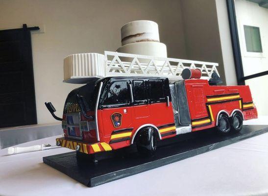 Amazingly detailed fire truck groom's cake!