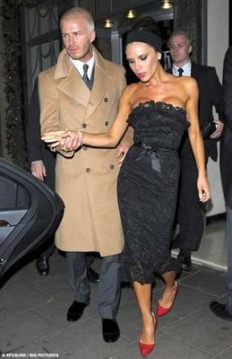 Victoria Beckham in Elizabeth Mason Couture 'Victoria' black lace cocktail dress New Years Eve, London  2009